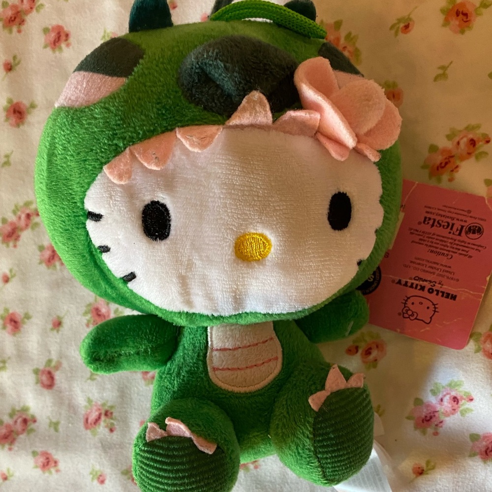 Hello kitty dinosaur